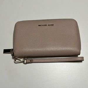 Michael Kors pink wristlet/phone case